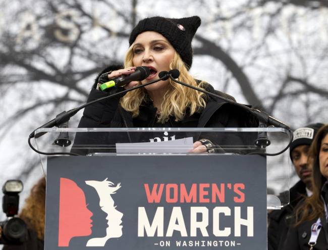Madonna speaks during the Women's March on Washington, Saturday, Jan. 21, 2017, in Washington. (AP Photo/Jose Luis Magana)