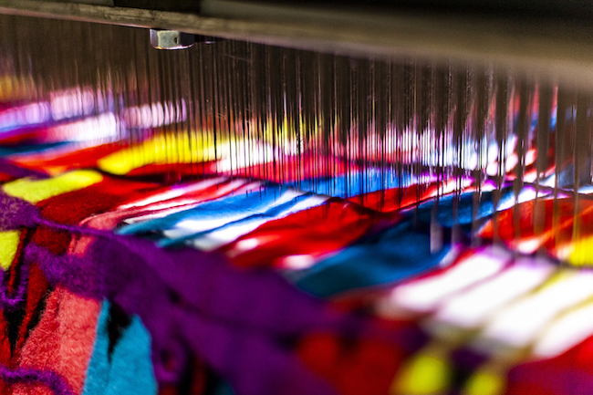 『糸乱れ筋』に用いられるニードルパンチ機（部分） 展示風景：「Sudo Reiko: Making NUNO Textiles」CHAT（Centre for Heritage, Arts and Textile）Hong Kong、2019-2020 ©CHAT(Centre for Heritage, Arts and Textile)Hong Kong